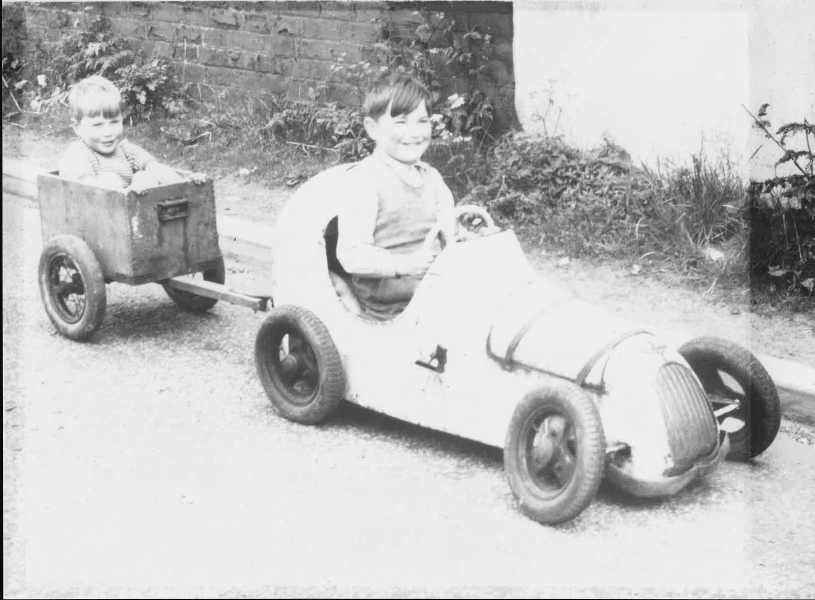 John Wheeldon 10 years old in a pedal car